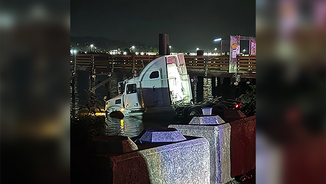 Stolen semi-truck driven into Fraser River after police chase